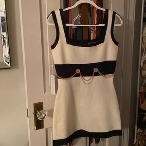 Beautiful & timeless. This Ronny Kobo dress is the perfect add to your wardrobe.